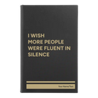 Small black/gold leatherette journal laser etched with 'Fluent in Silence' design