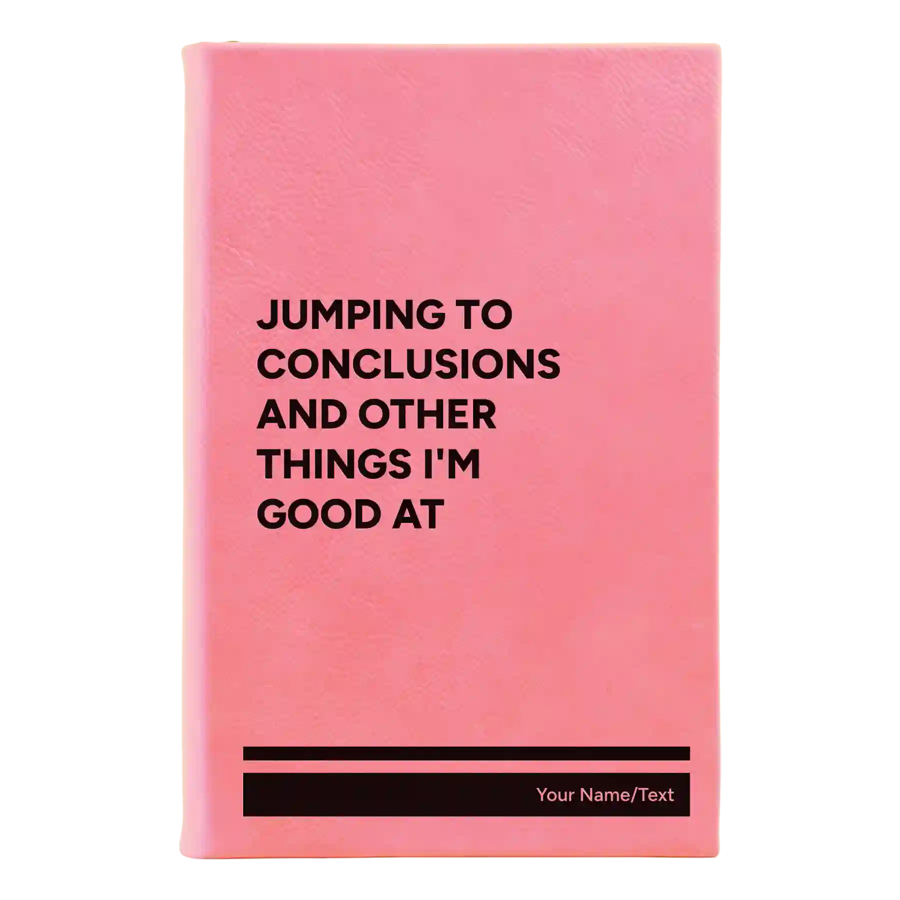 Small pink leatherette sketch book laser etched with 'Jumping to conclusions and other things Im good at' design