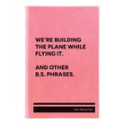 Small pink leatherette journal laser etched with 'We're Building The Plane While Flying It. And Other B.S. Phrases' design