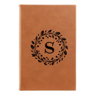 Small rawhide leatherette sketch book laser etched with 'Floral Circle with Initial' design