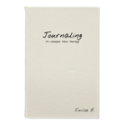 Small white leatherette journal laser etched with 'Journaling' design