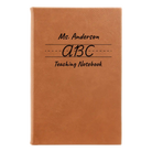 Small rawhide leatherette sketch book laser etched with 'Teaching Notebook' design