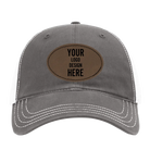 Custom charcoal Richardson 111 Unstructured Trucker Hat with laser etched oval stitch leatherette patch