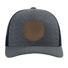 Custom navy heather navy Richardson 115CH Low Pro Trucker Hat with laser etched circle leatherette patch