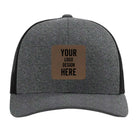Custom black heather Richardson 115CH Low Pro Trucker Hat with laser etched square leatherette patch