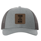 Custom gray Richardson 115 Low Pro Trucker Hat with laser etched square stitch leatherette patch