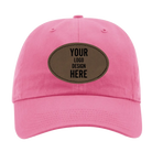 Custom hot pink Richardson 320 Cotton Twill Hat with laser etched oval stitch leatherette patch