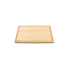Angle view of maple 11 x 17 butcher block with juice groove cutting/charcuterie board