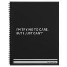 Large black spiral notebook laser etched with 'Trying to Care' design