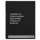 Large black spiral notebook laser etched with 'Jumping to conclusions and other things Im good at' design