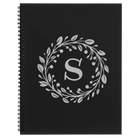 Large black spiral notebook laser etched with 'Floral Circle with Initial' design