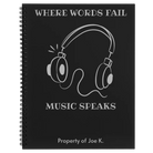 Large black spiral notebook laser etched with 'Music Speaks' design