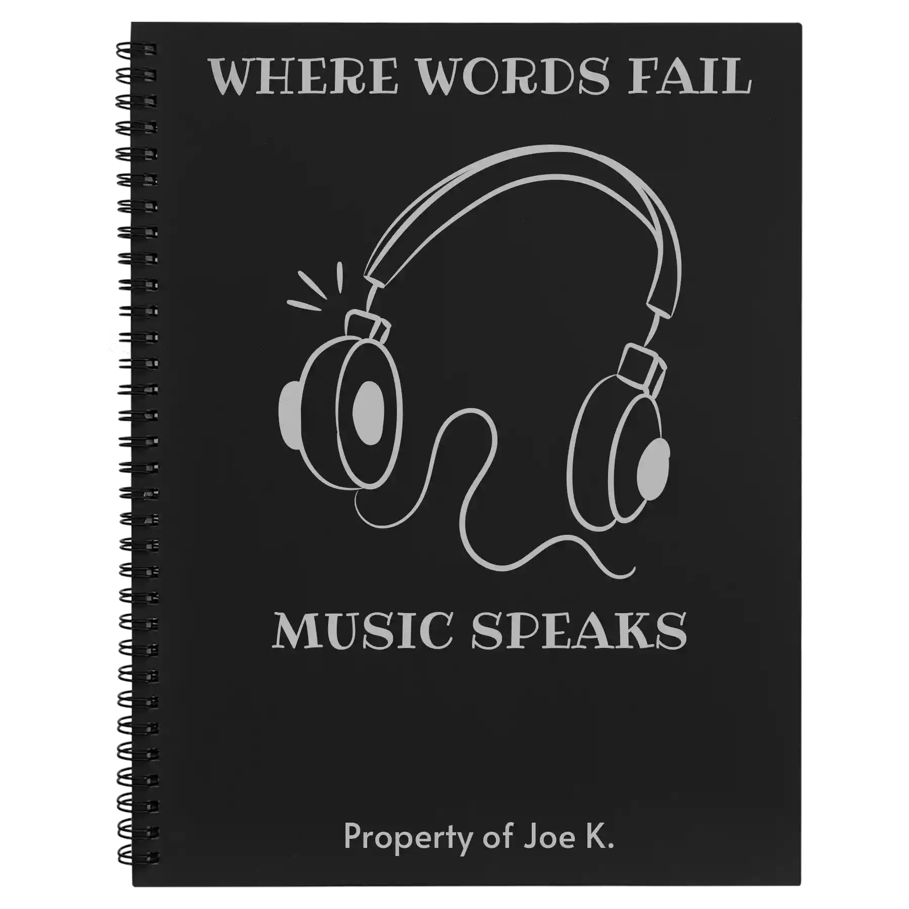 Large black spiral notebook laser etched with 'Music Speaks' design