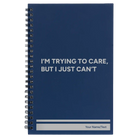 Small blue spiral notebook laser etched with 'Trying to Care' design