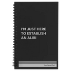Small black spiral notebook laser etched with 'Establish an Alibi' design
