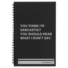 Small black spiral notebook laser etched with 'I Dont Say' design