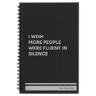 Small black spiral notebook laser etched with 'Fluent in Silence' design