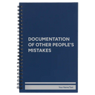 Small blue spiral notebook laser etched with 'Other Peoples Mistakes' design