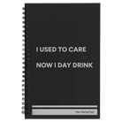 Small black spiral notebook laser etched with 'Day Drink' design