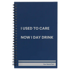 Small blue spiral notebook laser etched with 'Day Drink' design