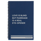 Small blue spiral notebook laser etched with 'Love is Blind' design
