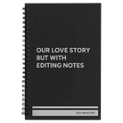 Small black spiral notebook laser etched with 'Our Love Story' design