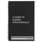 Small black spiral notebook laser etched with 'A guide to caring strategically' design