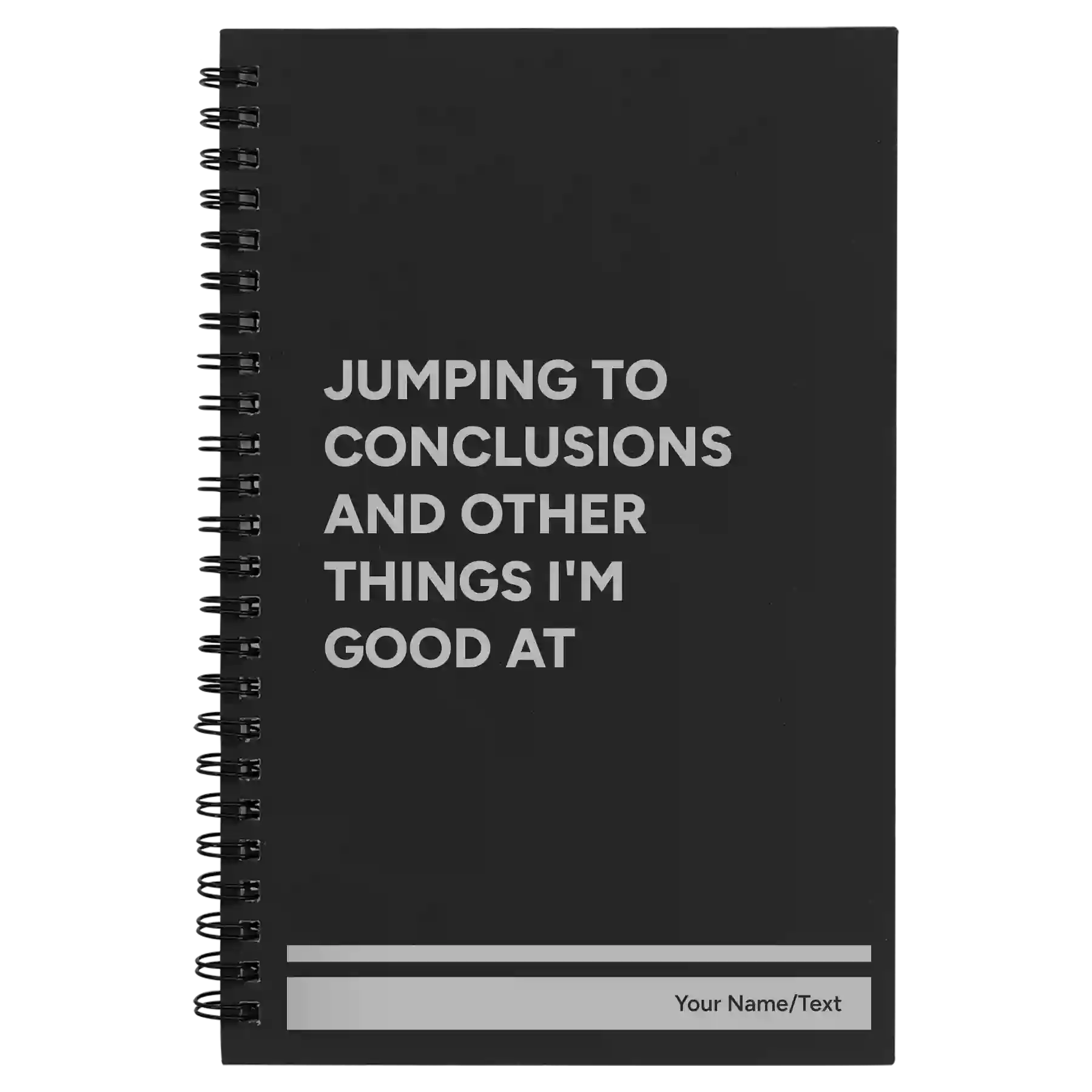 Small black spiral notebook laser etched with 'Jumping to conclusions and other things Im good at' design