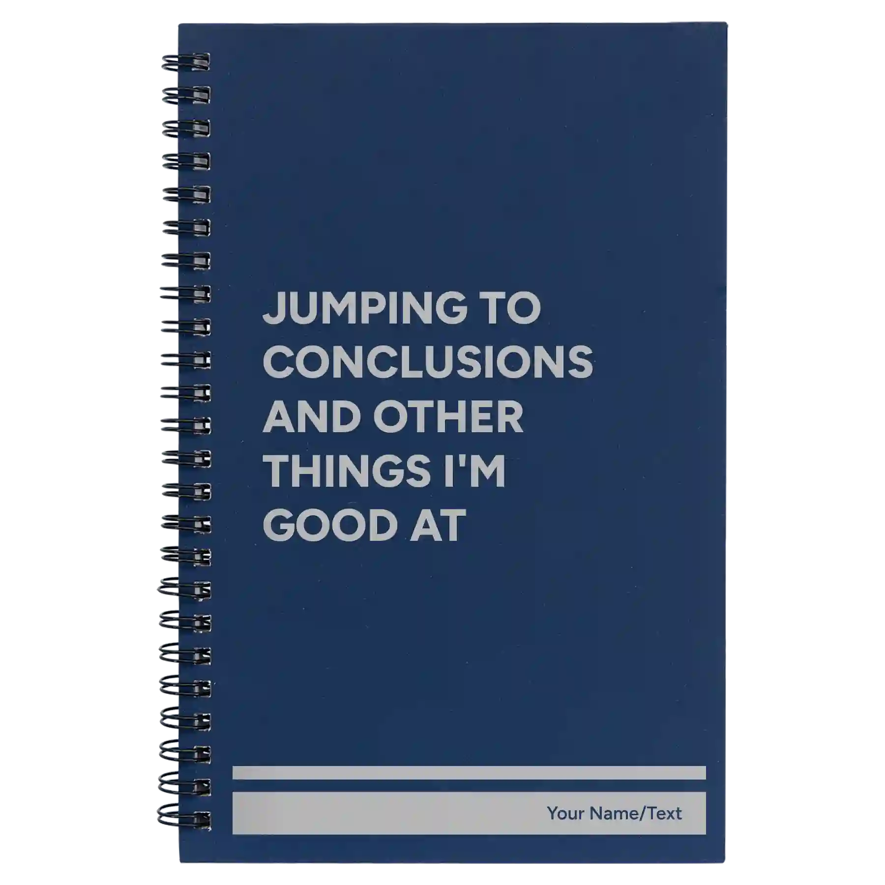 Small blue spiral notebook laser etched with 'Jumping to conclusions and other things Im good at' design