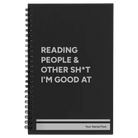 Small black spiral notebook laser etched with 'Reading people other sht Im good at' design