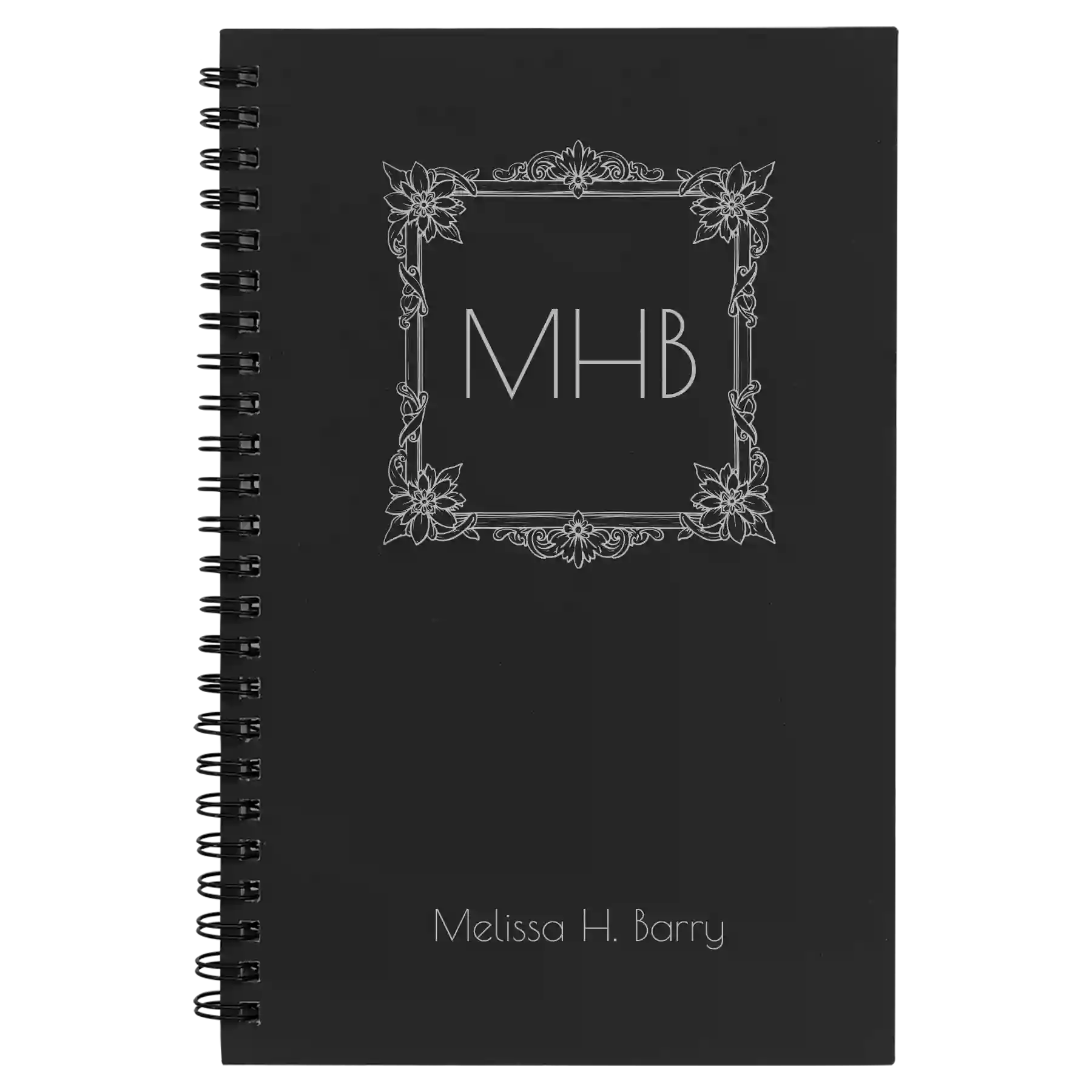 Small black spiral notebook laser etched with 'Floral Frame' design