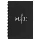 Small black spiral notebook laser etched with 'Flower Initial' design
