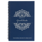 Small blue spiral notebook laser etched with 'Moments of Gratitude' design