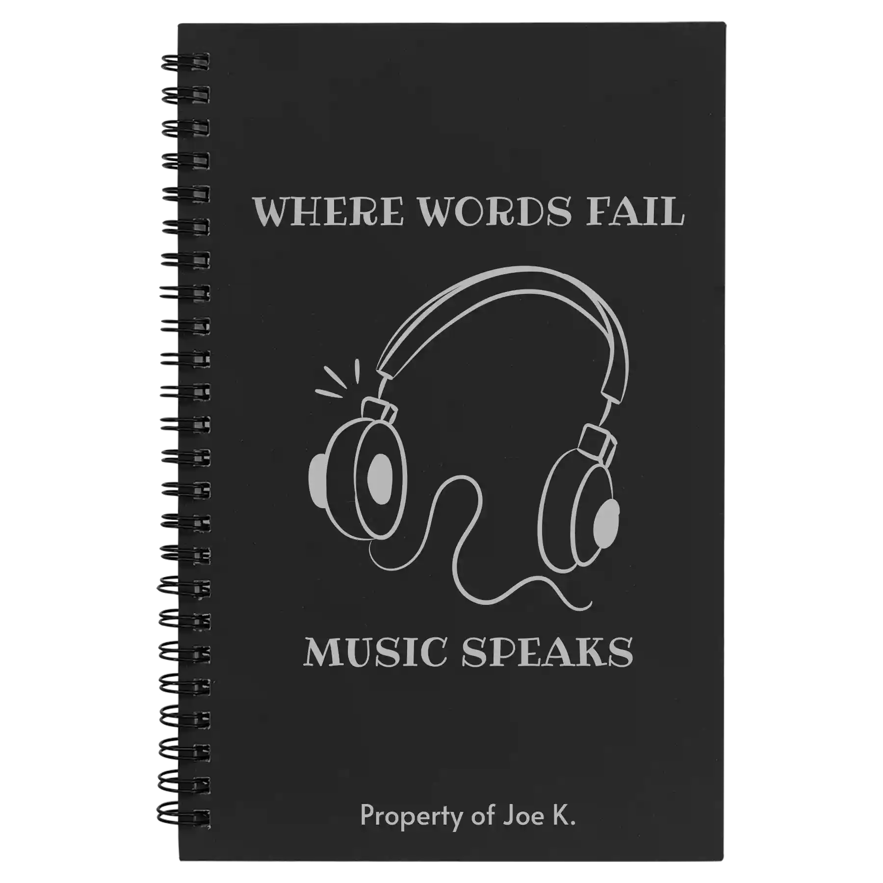 Small black spiral notebook laser etched with 'Music Speaks' design