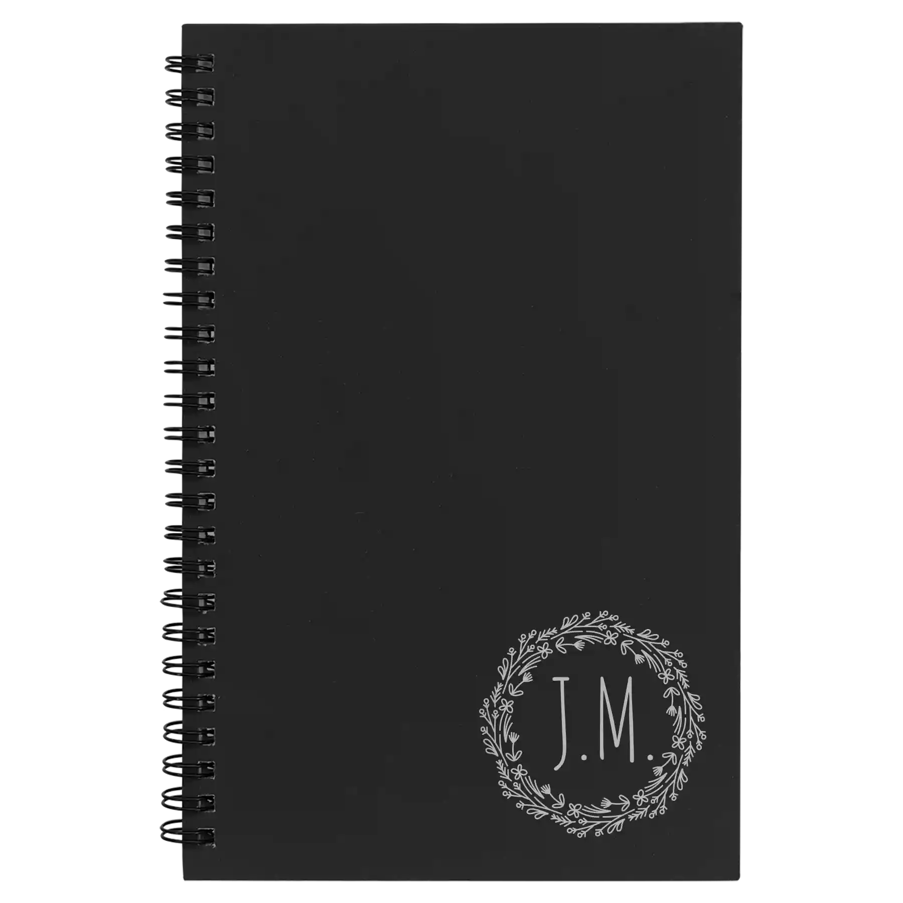 Small black spiral notebook laser etched with 'Wreath Initials' design