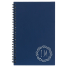 Small blue spiral notebook laser etched with 'Wreath Initials' design
