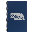 Small blue spiral notebook laser etched with 'Nebraska Home' design