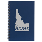 Small blue spiral notebook laser etched with 'Idaho Home' design