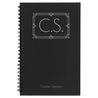 Small black spiral notebook laser etched with 'Art Deco Initials' design