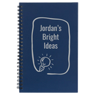 Small blue spiral notebook laser etched with 'Bright Ideas Journal' design