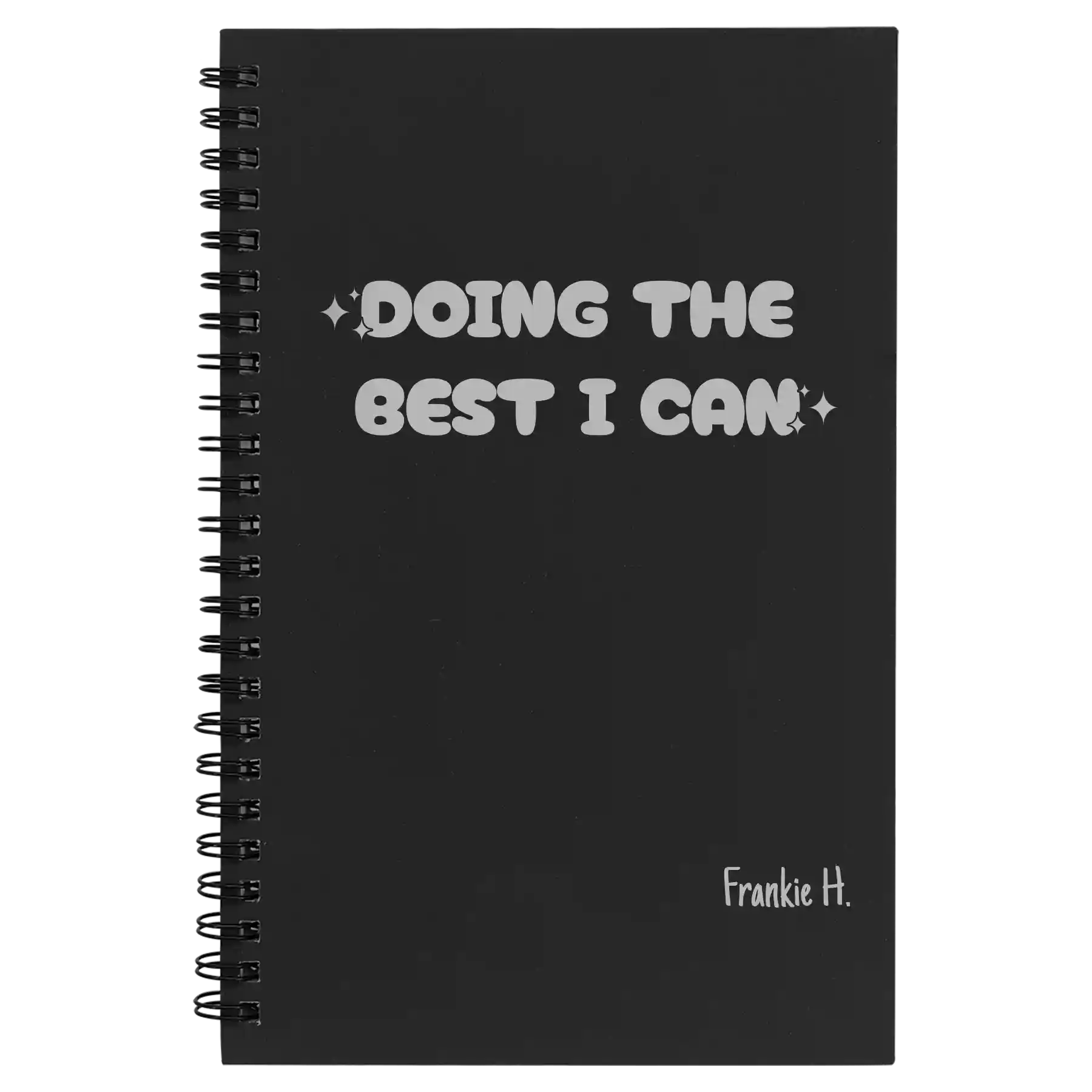 Small black spiral notebook laser etched with 'Doing the Best' design