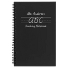 Small black spiral notebook laser etched with 'Teaching Notebook' design