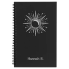Small black spiral notebook laser etched with 'Sunburst' design
