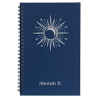 Small blue spiral notebook laser etched with 'Sunburst' design