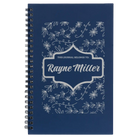 Small blue spiral notebook laser etched with 'This Journal Belongs to' design